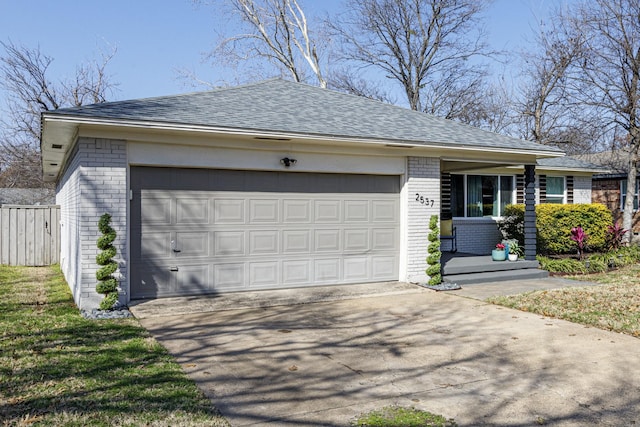 ranch-style home featuring a garage