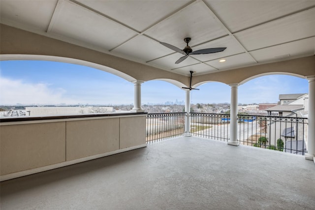 view of patio / terrace featuring ceiling fan and a balcony