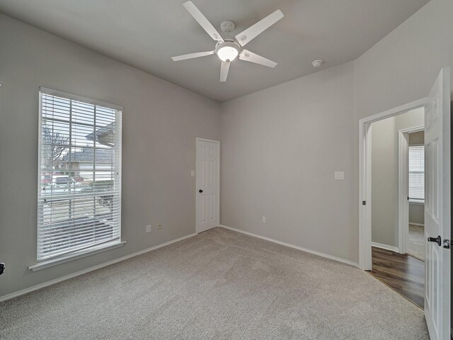 821 Grace Ln, Saginaw, TX 76179 - carpeted empty room featuring a ceiling fan and baseboards