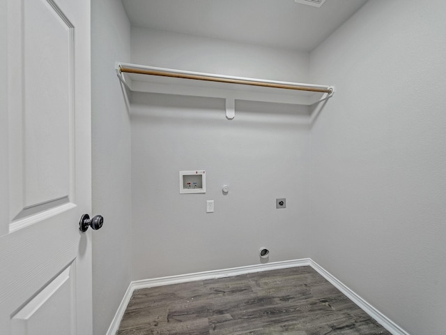 821 Grace Ln, Saginaw, TX 76179 - clothes washing area with electric dryer hookup, gas dryer hookup, washer hookup, and dark wood-type flooring