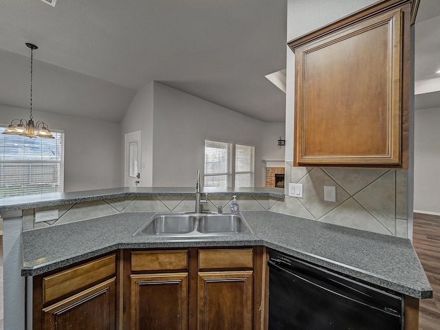 kitchen featuring plenty of natural light, black dishwasher, sink, and decorative backsplash