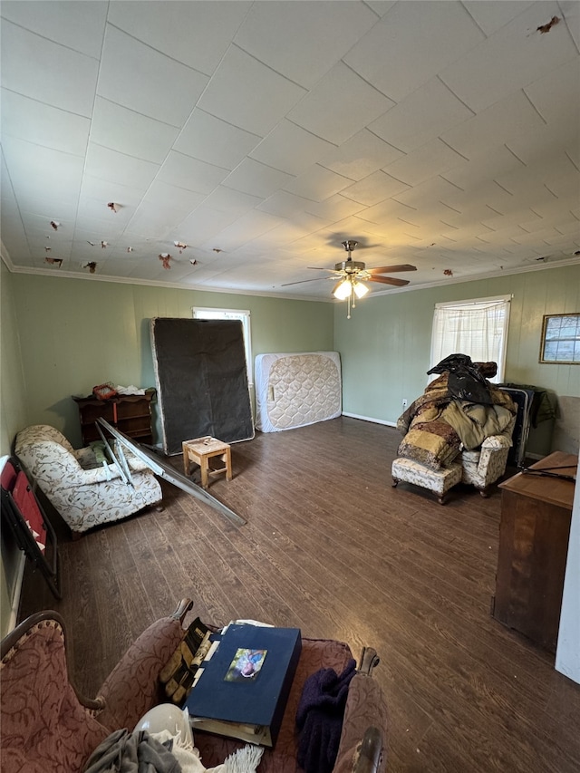 bedroom featuring crown molding, ceiling fan, and dark hardwood / wood-style floors