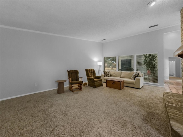 carpeted living room featuring ornamental molding and a textured ceiling