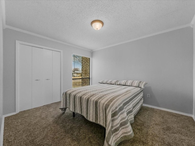 bedroom featuring crown molding, a textured ceiling, and dark colored carpet