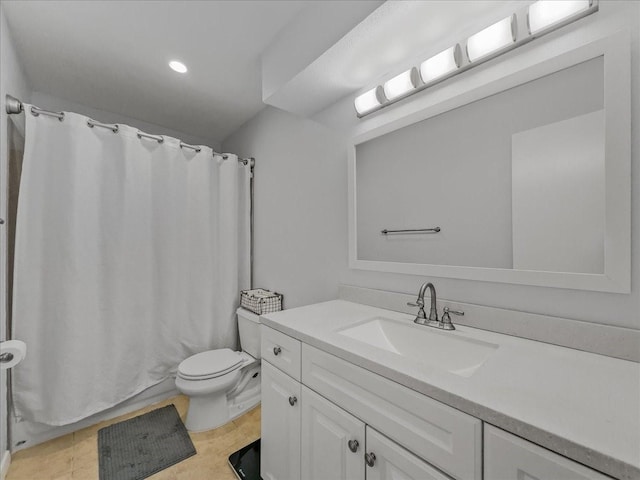 bathroom featuring vanity, toilet, and a shower with shower curtain