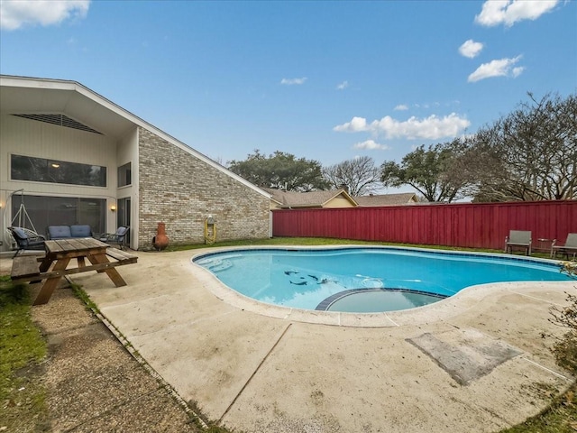 view of pool featuring a patio