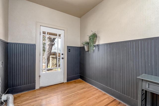 doorway to outside featuring hardwood / wood-style flooring