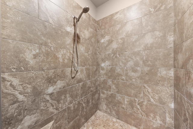 details featuring a tile shower