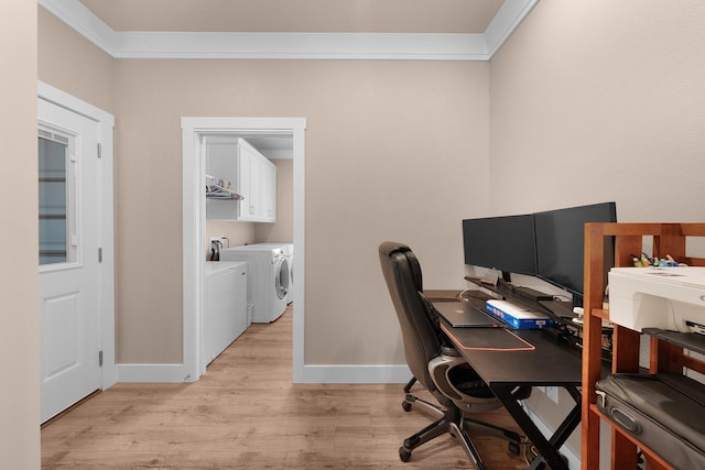 office space with ornamental molding, separate washer and dryer, and light hardwood / wood-style flooring