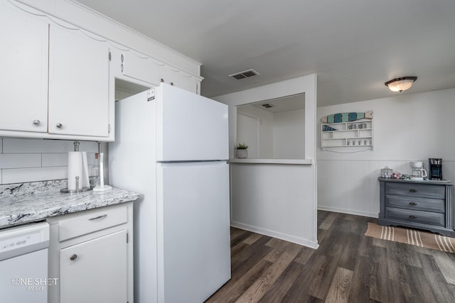 kitchen with white cabinetry, dark hardwood / wood-style flooring, and white appliances