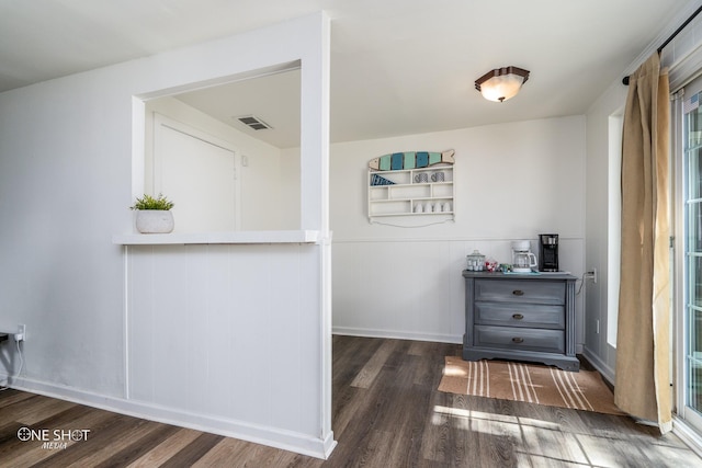 interior space with dark hardwood / wood-style flooring