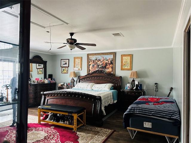 bedroom with ornamental molding, dark hardwood / wood-style floors, and ceiling fan