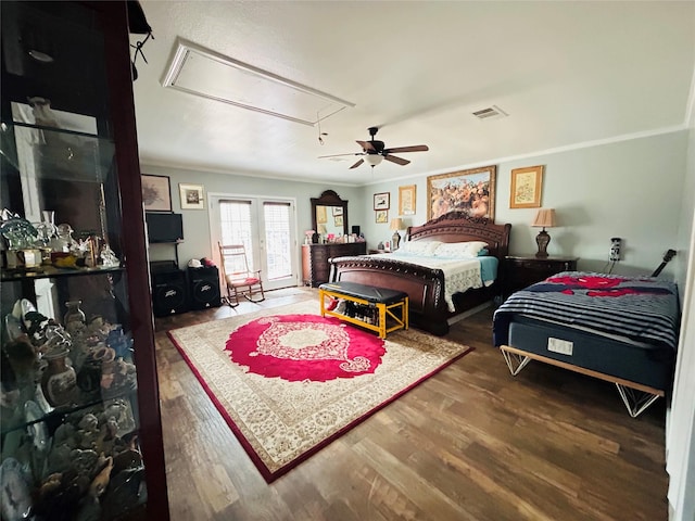 bedroom with ornamental molding, hardwood / wood-style floors, and ceiling fan