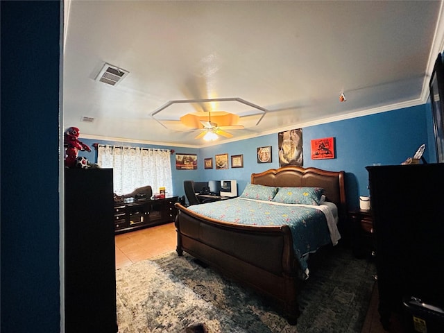 tiled bedroom featuring ornamental molding and ceiling fan