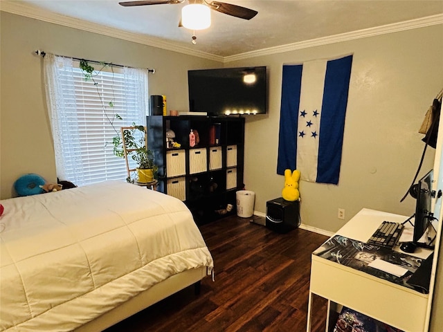 bedroom featuring crown molding, dark wood-type flooring, and ceiling fan