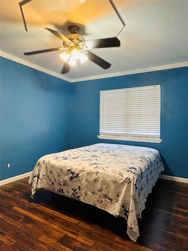 bedroom with crown molding, ceiling fan, and dark hardwood / wood-style flooring