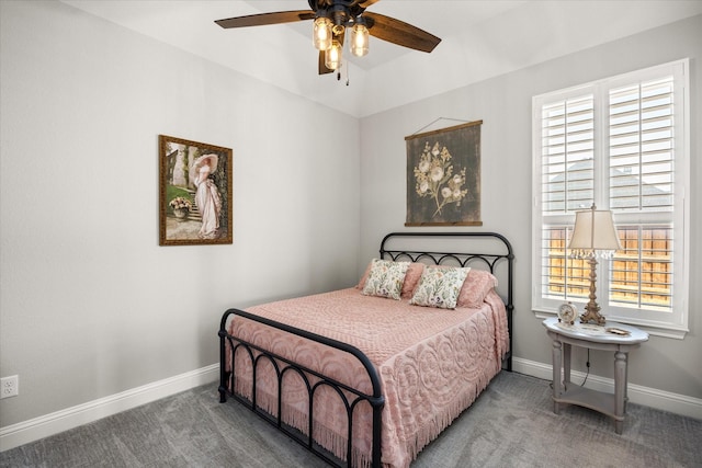 bedroom featuring carpet floors, baseboards, and a ceiling fan