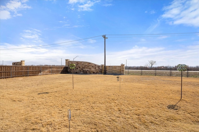 view of yard with fence