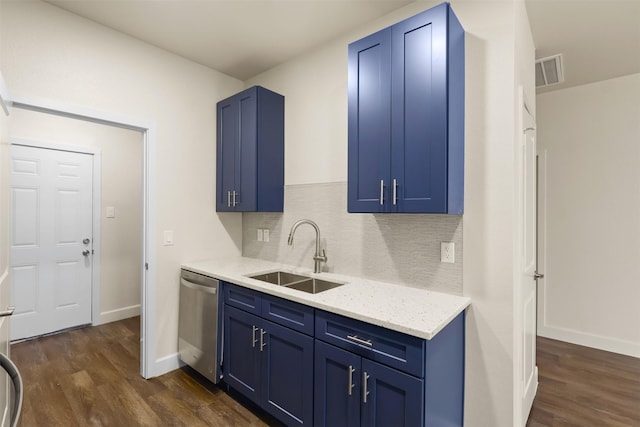 kitchen with dark hardwood / wood-style floors, dishwasher, sink, and blue cabinetry