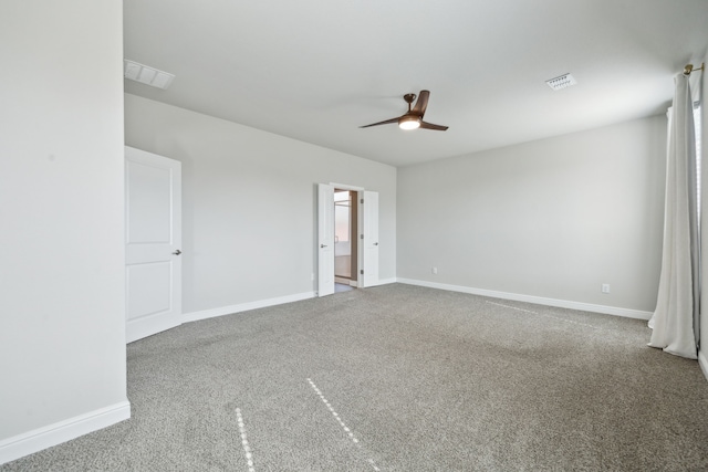 unfurnished room featuring carpet floors and ceiling fan