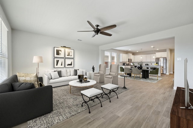 living room with ceiling fan