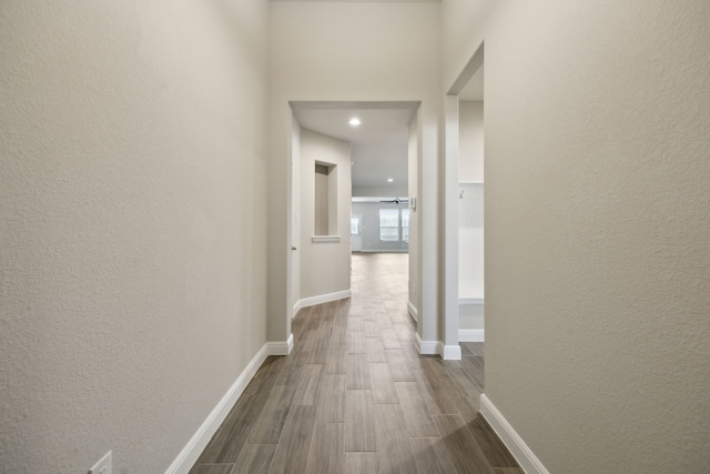 hallway featuring dark hardwood / wood-style floors