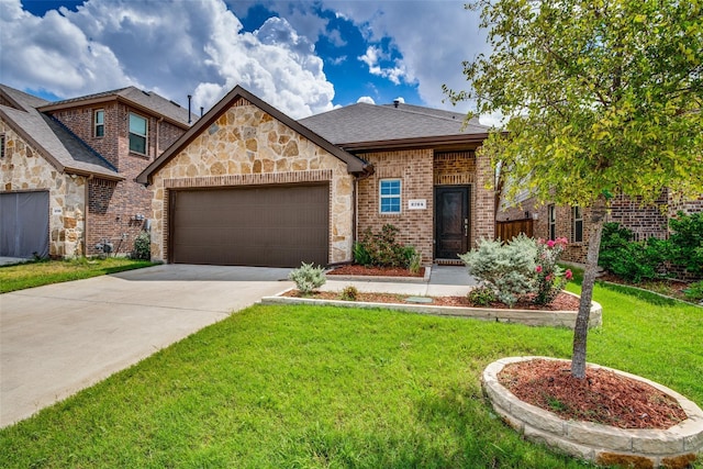 view of front facade featuring a garage and a front lawn