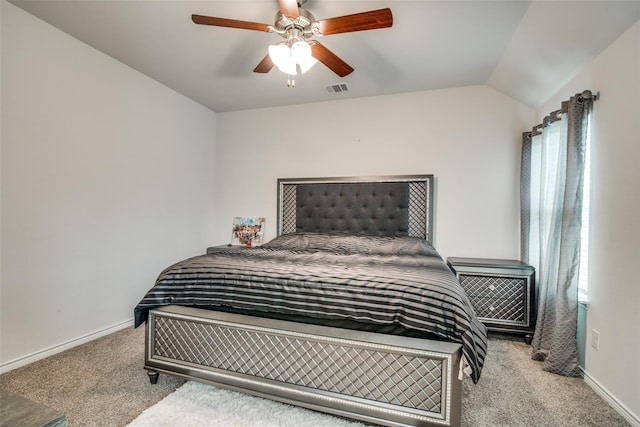 carpeted bedroom featuring ceiling fan and lofted ceiling
