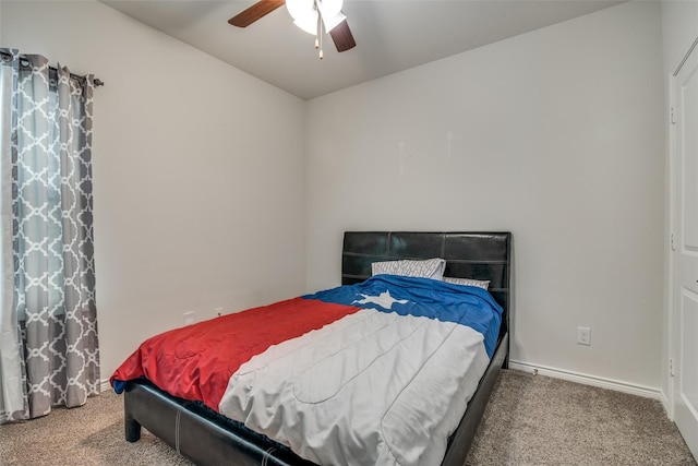 carpeted bedroom featuring ceiling fan