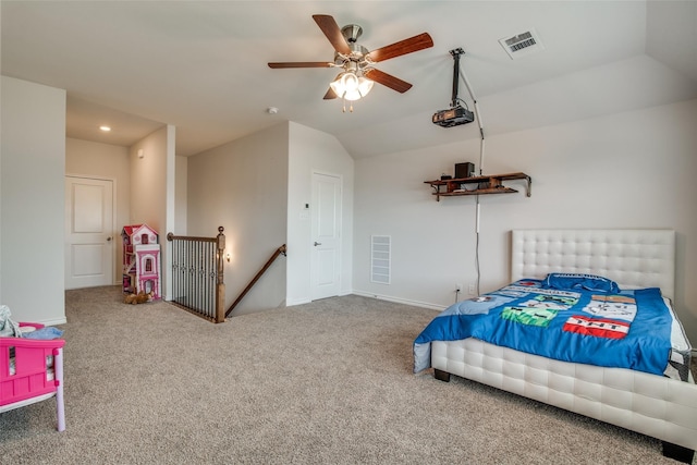 carpeted bedroom featuring vaulted ceiling and ceiling fan