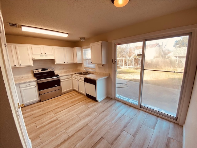 kitchen featuring sink, white cabinets, electric range, white dishwasher, and light hardwood / wood-style flooring