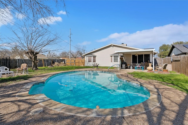 view of swimming pool with a fenced in pool, an outdoor fire pit, a fenced backyard, and a patio