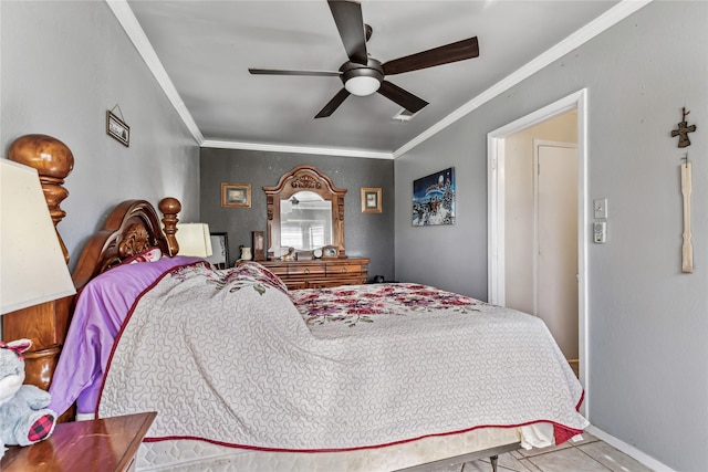 tiled bedroom with ceiling fan, ornamental molding, and baseboards