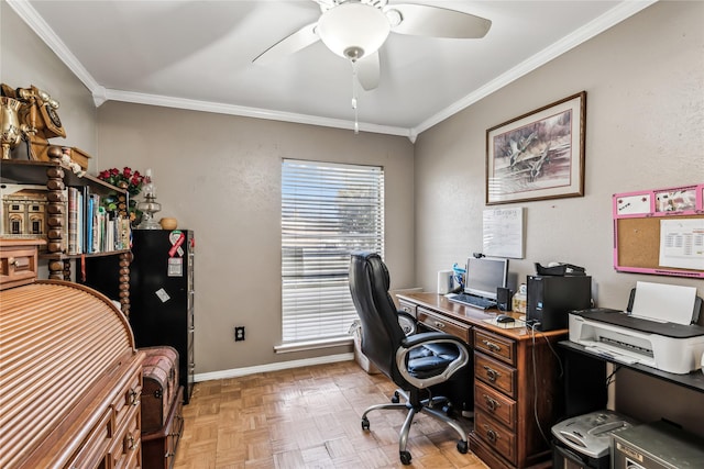 office space featuring a ceiling fan, baseboards, and crown molding