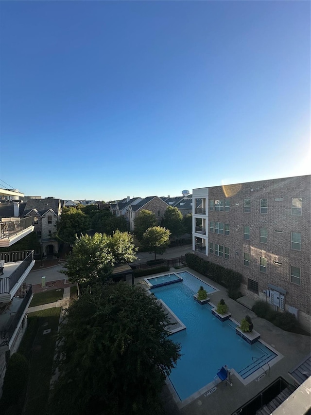 view of swimming pool with a patio area