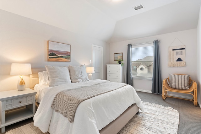 carpeted bedroom featuring vaulted ceiling