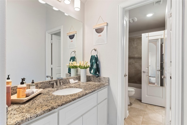 bathroom featuring visible vents, toilet, shower / tub combination, tile patterned floors, and vanity