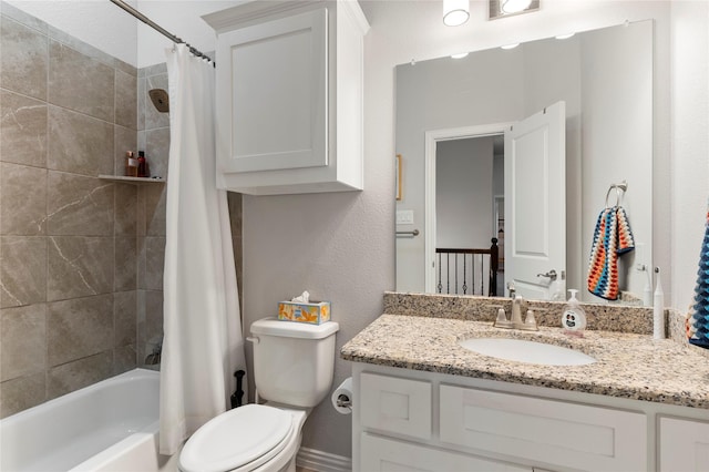 full bathroom featuring vanity, shower / tub combo with curtain, and toilet