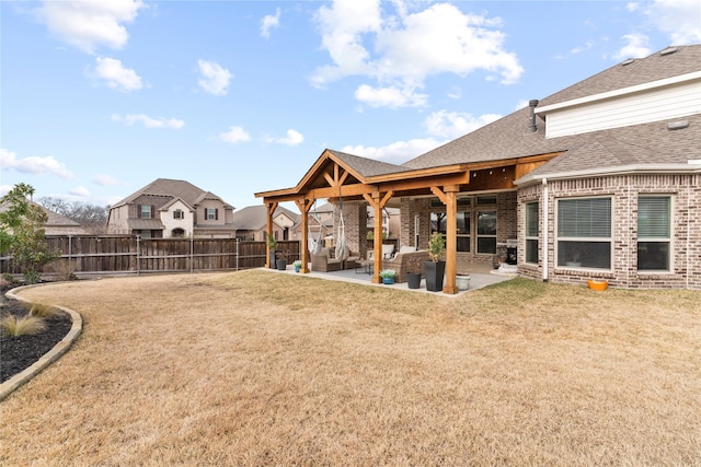 exterior space with a patio area and fence