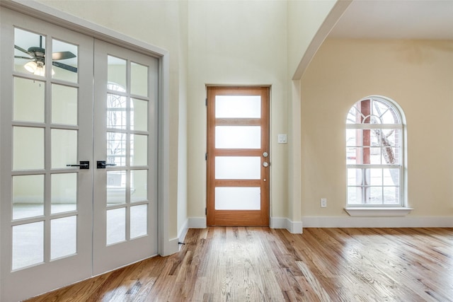 doorway featuring light hardwood / wood-style floors and french doors