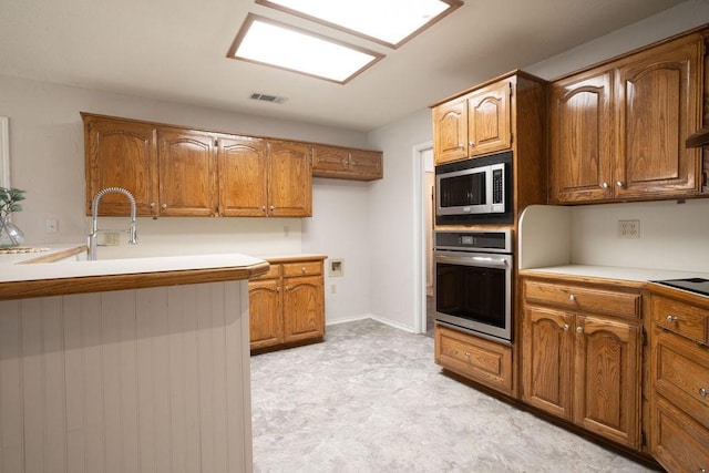 kitchen with appliances with stainless steel finishes