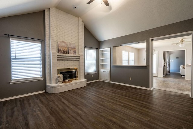 unfurnished living room with ceiling fan, dark hardwood / wood-style floors, and lofted ceiling