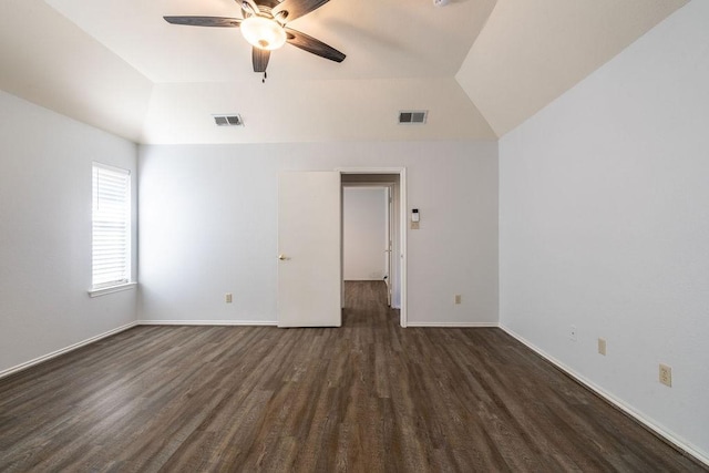 spare room with lofted ceiling, ceiling fan, and dark hardwood / wood-style floors