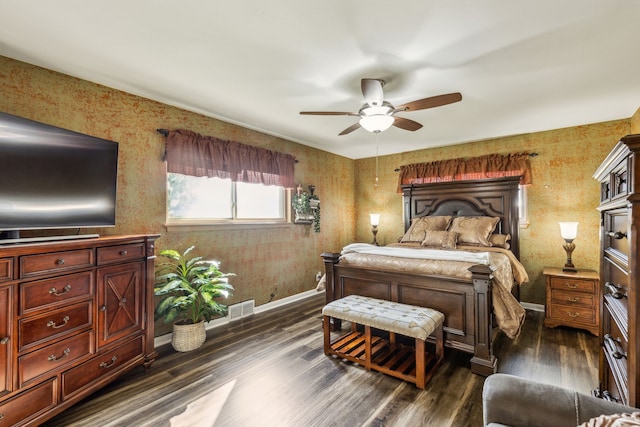 bedroom with dark wood-type flooring and ceiling fan