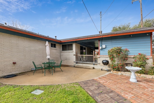 back of house featuring a patio area