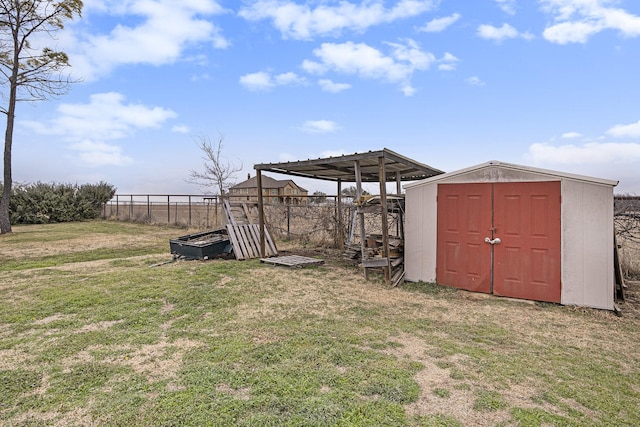view of shed featuring fence
