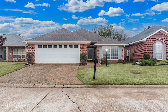 ranch-style home featuring a garage and a front lawn