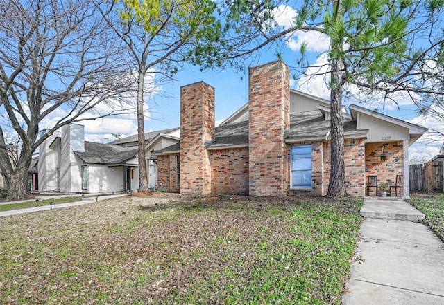 view of front of home with a front yard