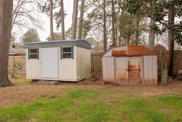 view of outbuilding with a yard