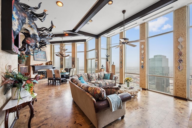 living room featuring expansive windows, ceiling fan, hardwood / wood-style floors, and beam ceiling